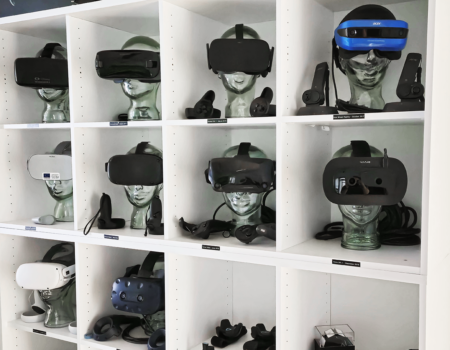 Different VR glasses in a shelf. Picture: Clever Simulation Entertainment / Kajaani University of Applied Sciences.