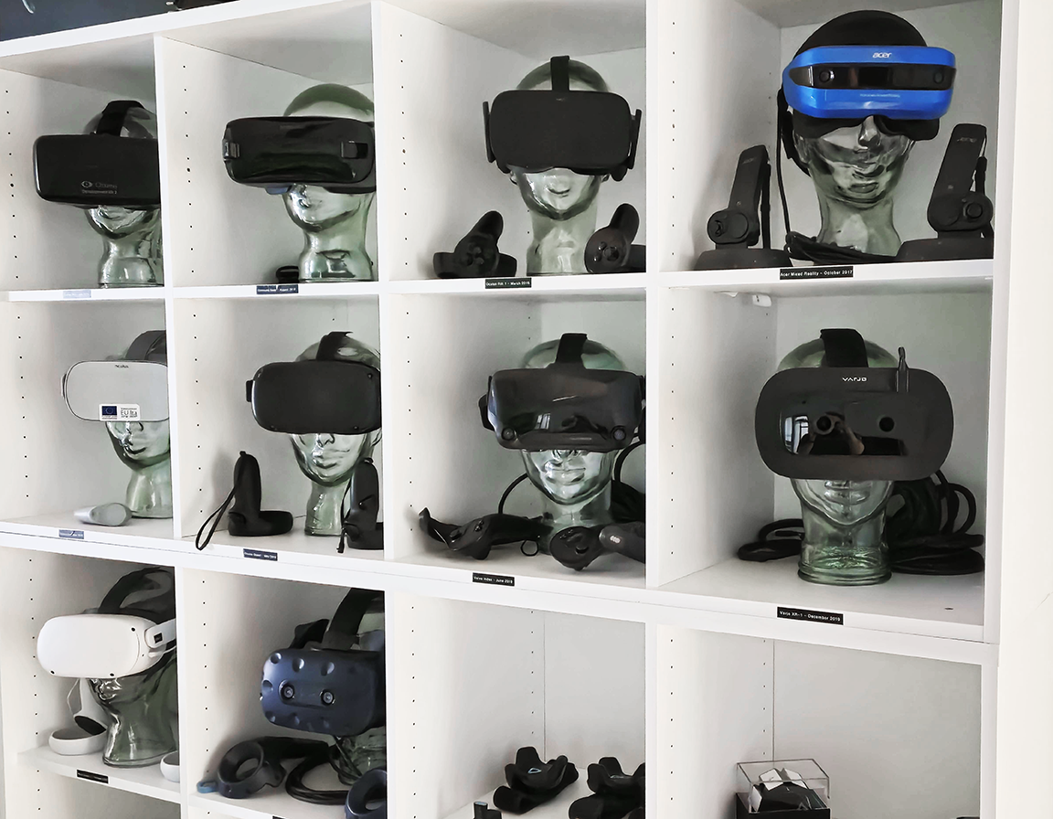 Different VR glasses in a shelf. Picture: Clever Simulation Entertainment / Kajaani University of Applied Sciences.